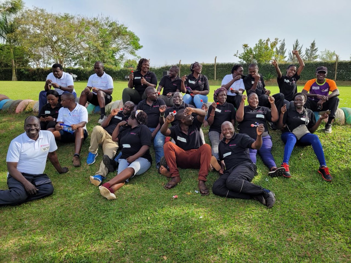 A group therapy and team wellness session outdoors